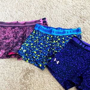 A bundle of 3 small size under armour   gym shorts
